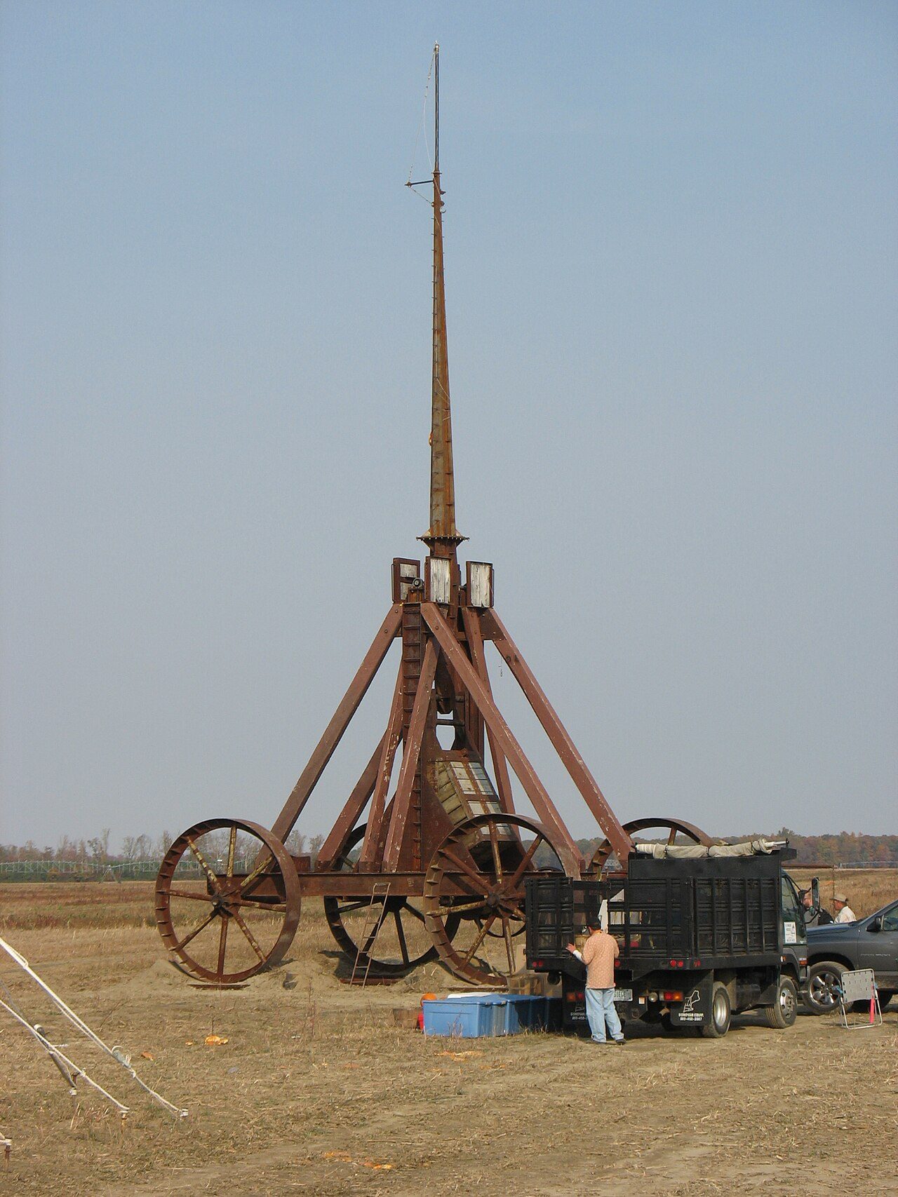A wheeled counterweight trebuchet at a pumpkin-throwing contest