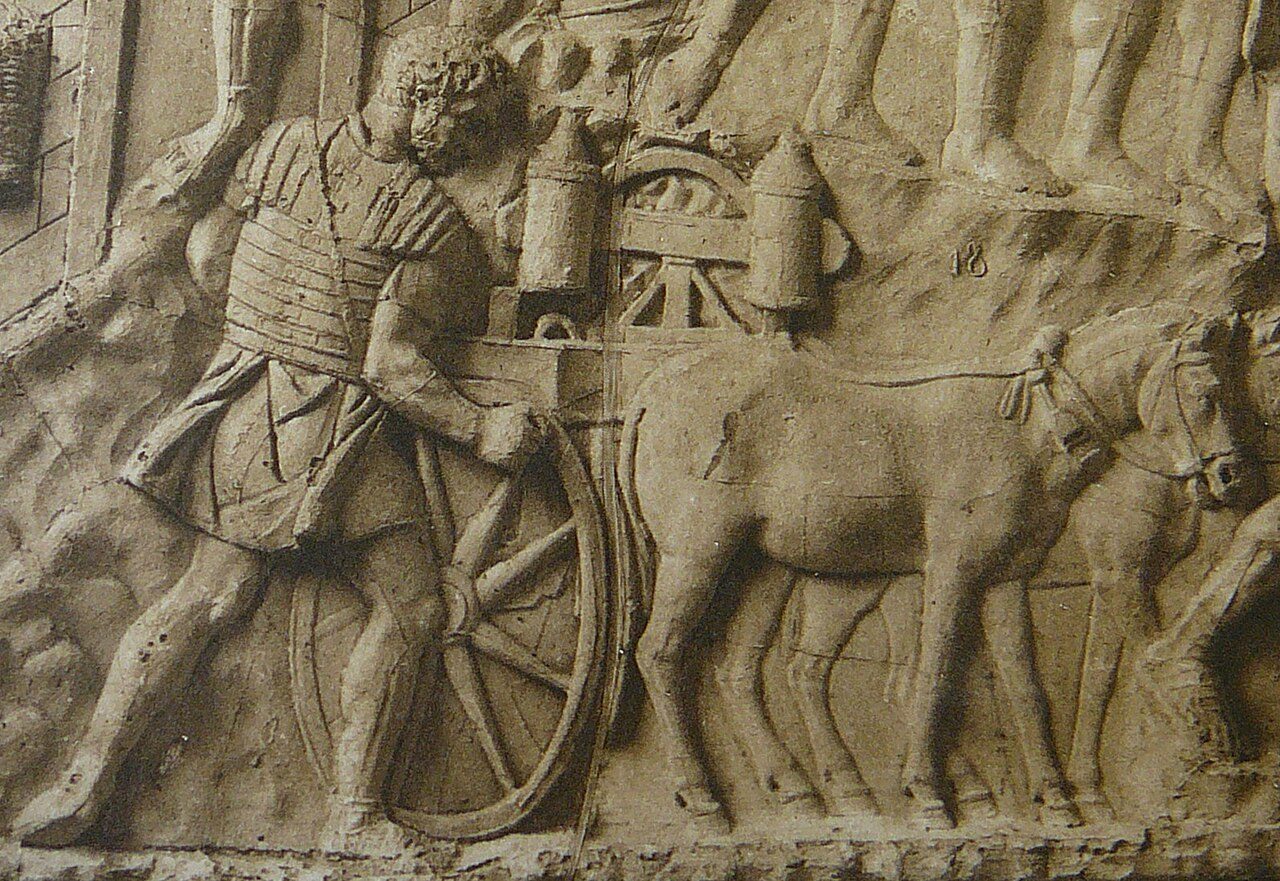 A carved relief of Roman soldiers working a cart-mounted bolt-throwing engine, from Trajan’s Column